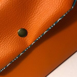 Pochette simili cuir Orange et tissu Bleu vert origami